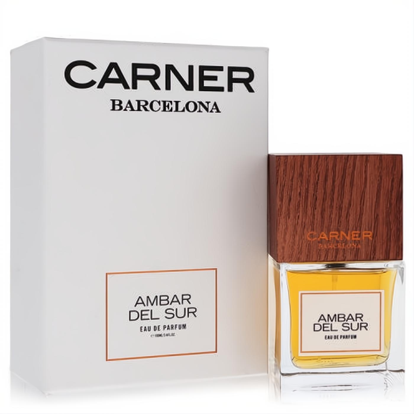 Luxurious Carner Barcelona Ambar Del Sur unisex EDP. Amber fragrance in a clear bottle with a distinctive wood cap, beside its elegant white box.