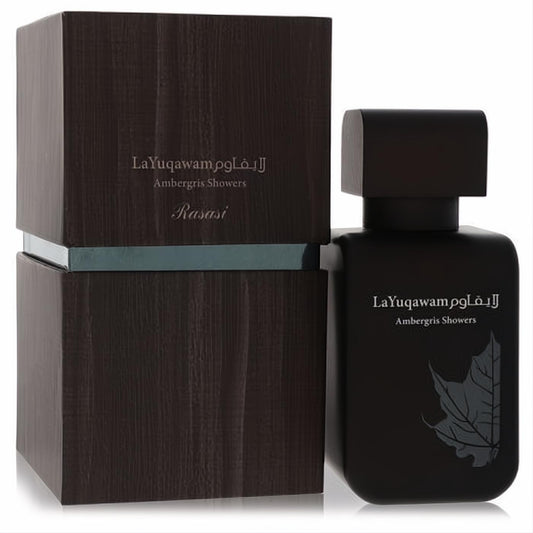 Sophisticated Rasasi Ambergris Showers EDP in a matte black bottle with a subtle leaf design and matching textured dark wood box.