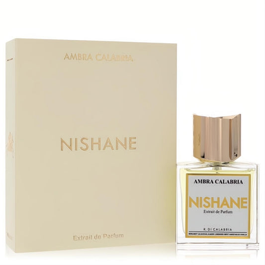 Nishane Ambra Calabria Extrait de Parfum. Sophisticated 1.7 oz clear glass bottle with distinctive gold cap and elegant cream box.