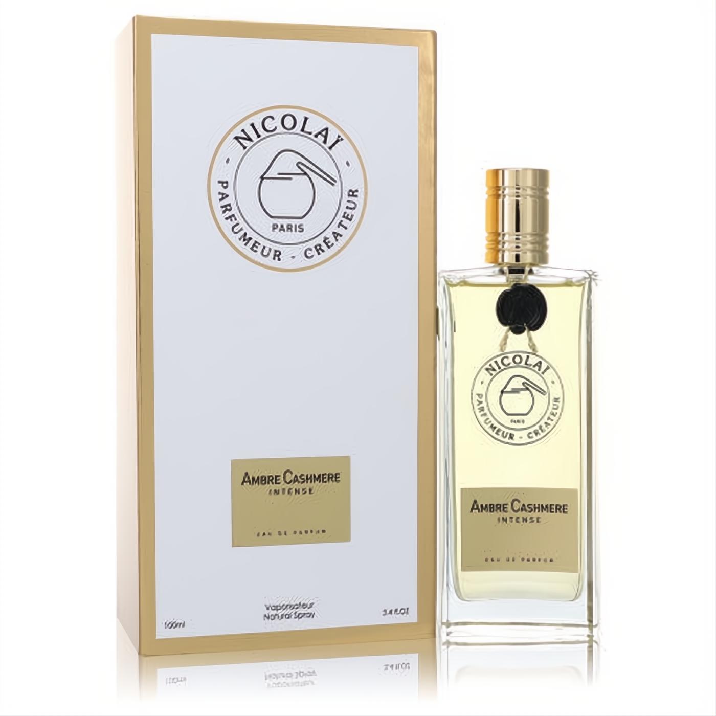 Experience Nicolai Ambre Cashmere Intense 3.4 oz unisex EDP. Elegant clear bottle with gold cap and white box.