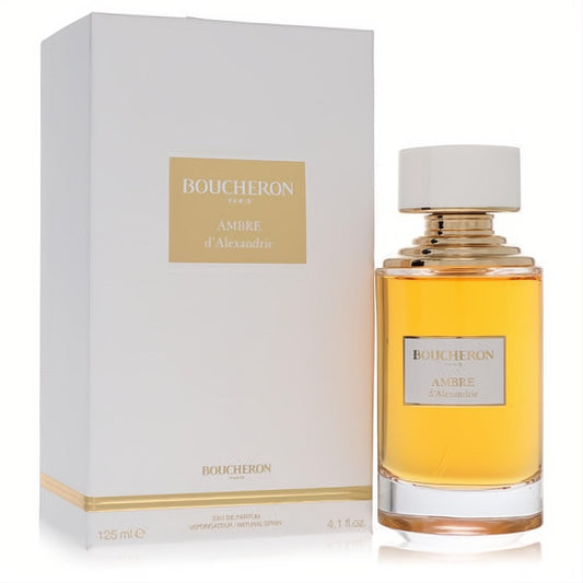 Luxurious Boucheron Ambre D'alexandrie 4.1 oz EDP spray bottle with warm amber liquid and its sophisticated white & gold packaging.