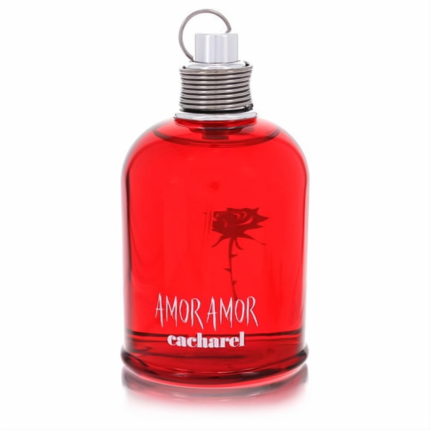 Stunning Amor Amor Cacharel women's perfume in a vibrant red glass bottle with a black rose graphic and sleek silver cap.