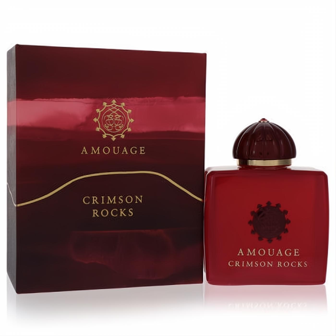 Luxurious Amouage Crimson Rocks unisex fragrance. Bold crimson red bottle with a ridged cap and elegant gold branding on bottle and box.
