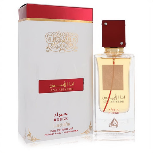 Lattafa Ana Abiyedh Rouge 2 oz unisex EDP. Elegant clear bottle with rich red cap, gold accents, and matching white & red box.
