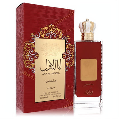 Stunning Ana Al Awwal Rouge Nusuk 3.4 oz Eau De Parfum. Features a rich red bottle with a gold crown cap and an ornate red & gold box.