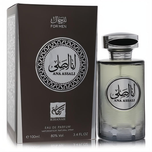 Luxurious Ana Assali by Rihanah 3.4 oz unisex EDP. Clear ribbed bottle, silver cap, and sophisticated dark brown box with Arabic script.