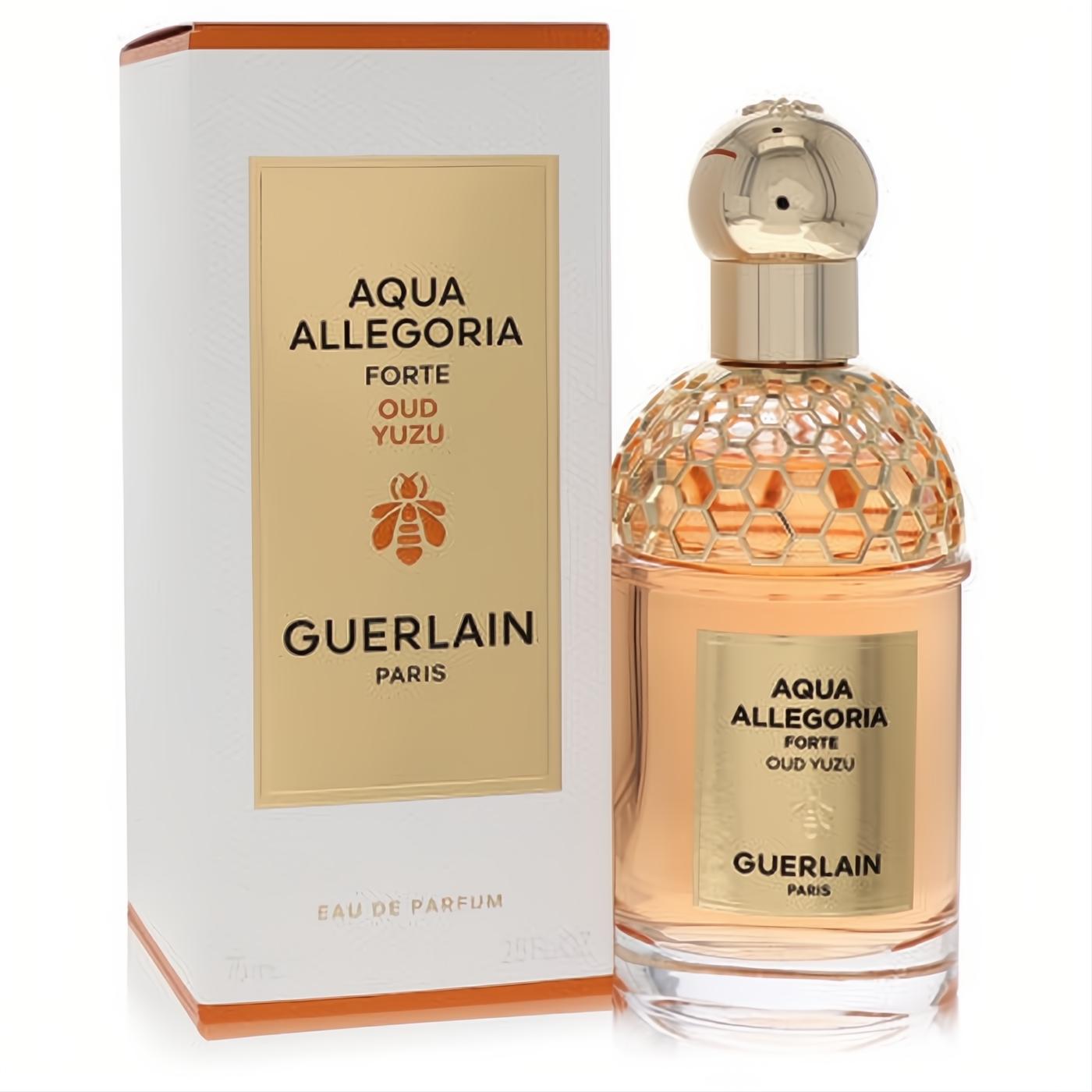 Elegant Guerlain Aqua Allegoria Oud Yuzu 2.5 oz EDP spray. Peach liquid, gold honeycomb cap, iconic bee logo on bottle and white box.