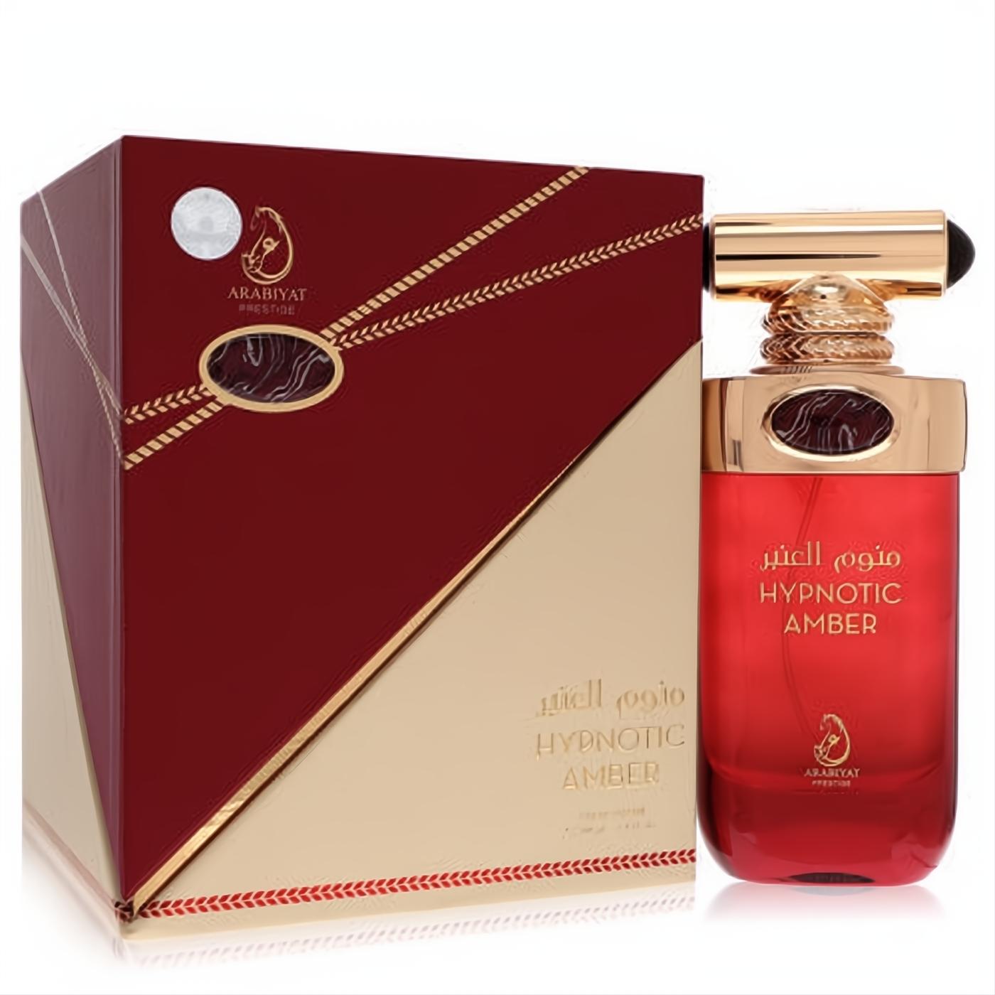 Elegant Arabiyat Hypnotic Amber 3.4 oz men's EDP. Deep red bottle, intricate gold cap, and luxurious red-gold box.