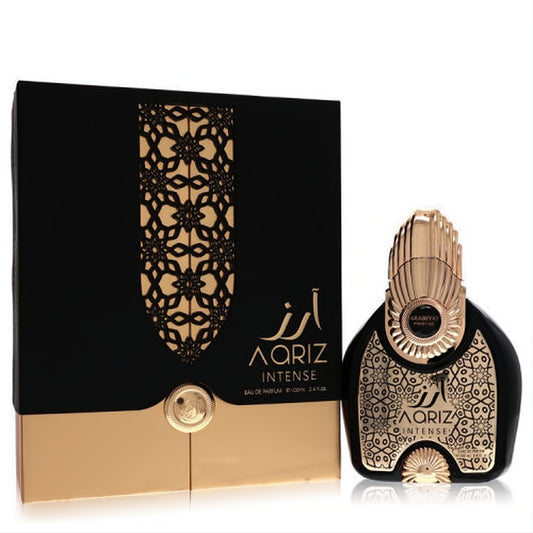 Exquisite Arabiyat Prestige Aariz Intense unisex EDP. Black bottle with ornate gold design, unique cap, and matching luxurious box. 3.4 oz.