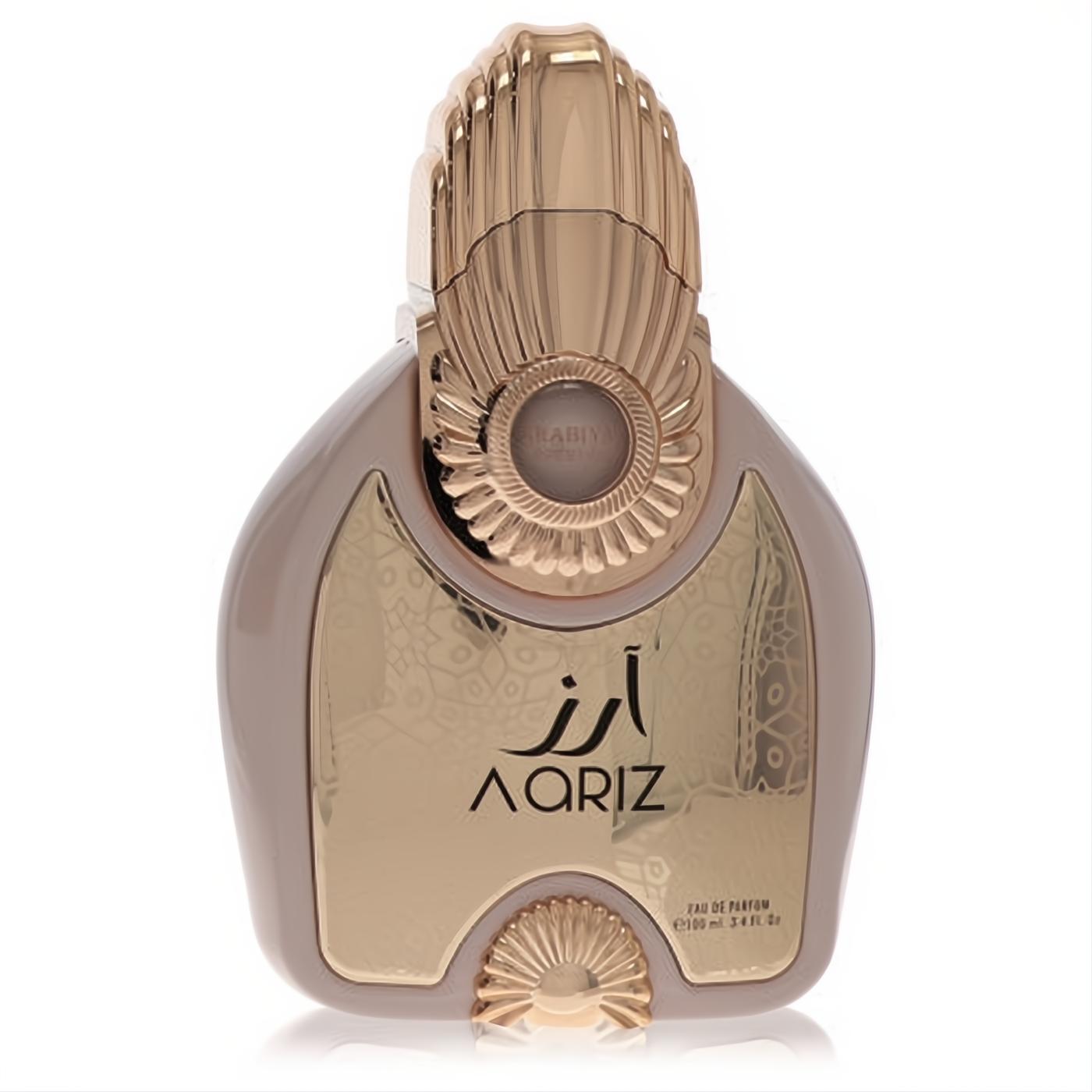 Luxurious Arabiyat Prestige Aariz 3.4 oz EDP. Distinctive taupe bottle with ornate rose gold cap and metallic 'AARIZ' panel.