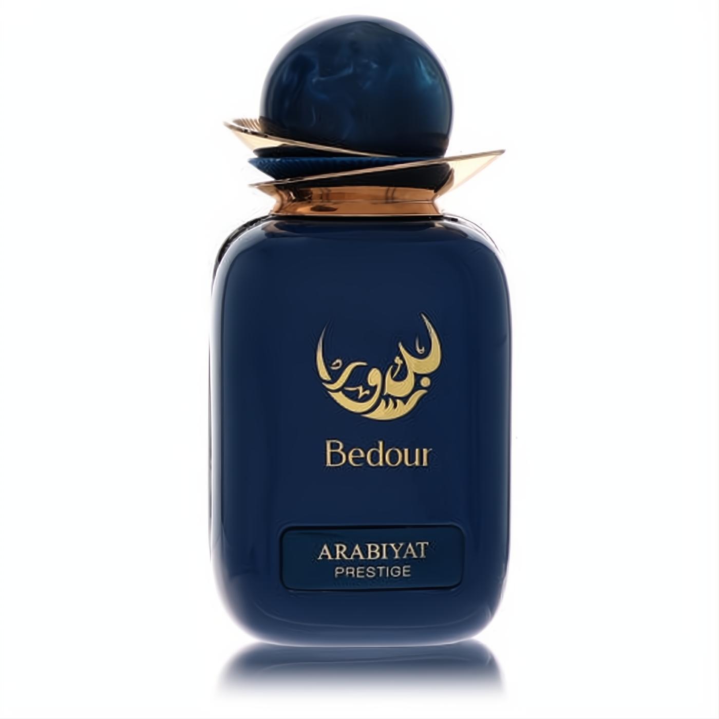 Exquisite Arabiyat Prestige Bedour Eau De Parfum. Deep navy bottle, elegant gold calligraphy, and unique marbled cap.