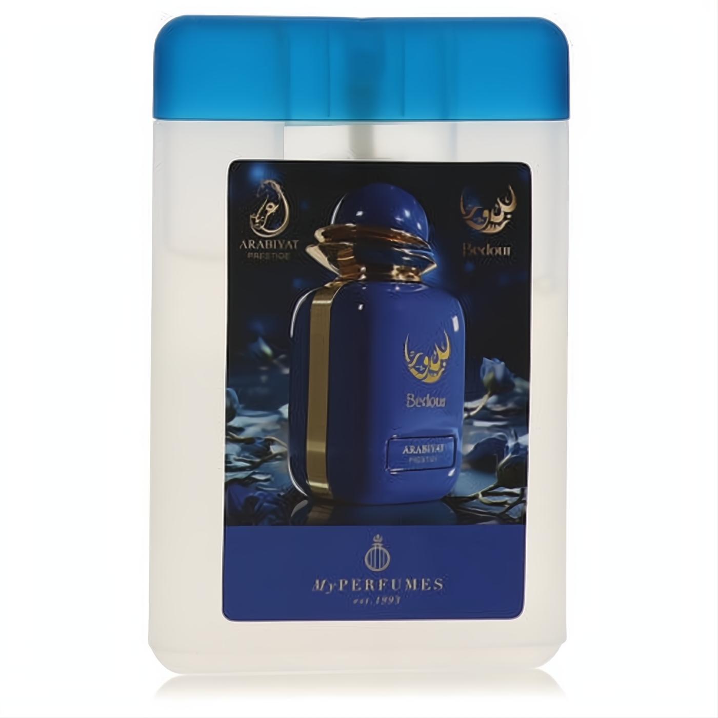 Arabiyat Prestige Bedour mini EDP spray. Translucent white bottle, vibrant blue cap, elegant dark blue label with gold accents. Unisex.