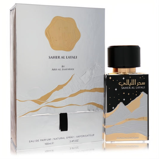 Elegant Ard Al Zaafaran Saher Al Layali unisex EDP. Silver box and black 3.4 oz bottle with striking gold desert mountain design.