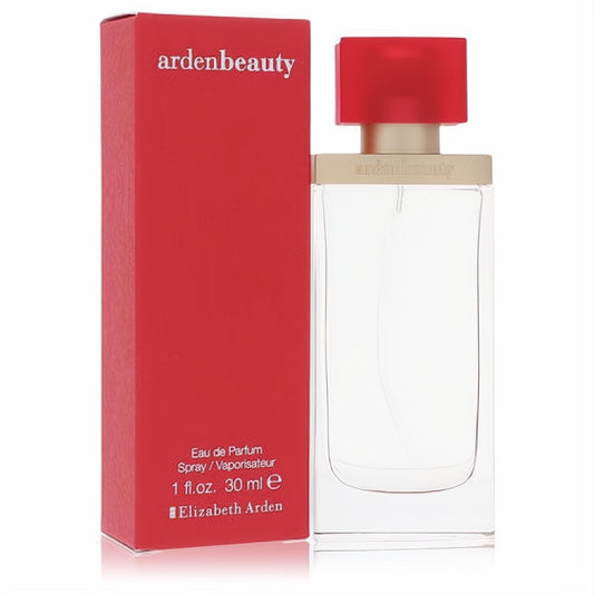Elevate your scent with Arden Beauty 1 oz EDP. Clear bottle, elegant gold band, and striking red cap next to its vibrant red box.