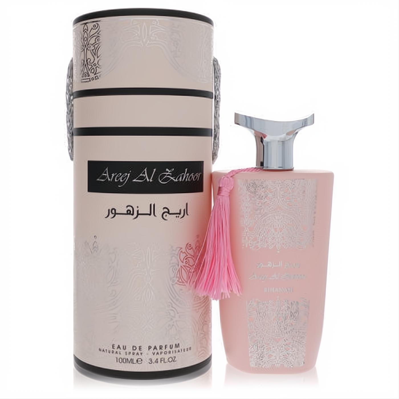 Stunning Areej Al Zahoor by Rihanah 3.4 oz EDP. Elegant pale pink bottle with silver cap, pink tassel, and ornate box.