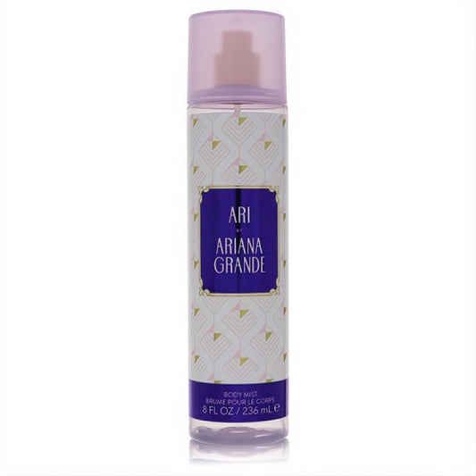 Ari by Ariana Grande 8 oz body mist. Clear bottle, elegant lavender cap, and stylish purple geometric label. Indulge in this captivating fruity floral scent!