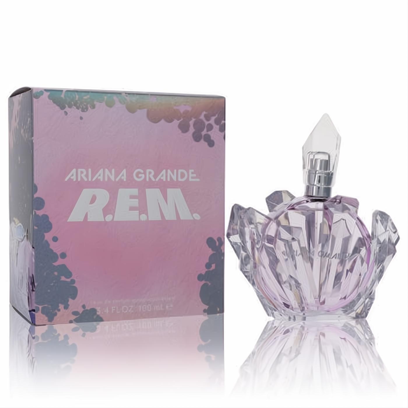 Ariana Grande R.E.M. 3.4 oz Eau De Parfum. Captivating faceted lavender glass bottle with crystal cap and iridescent pink packaging.