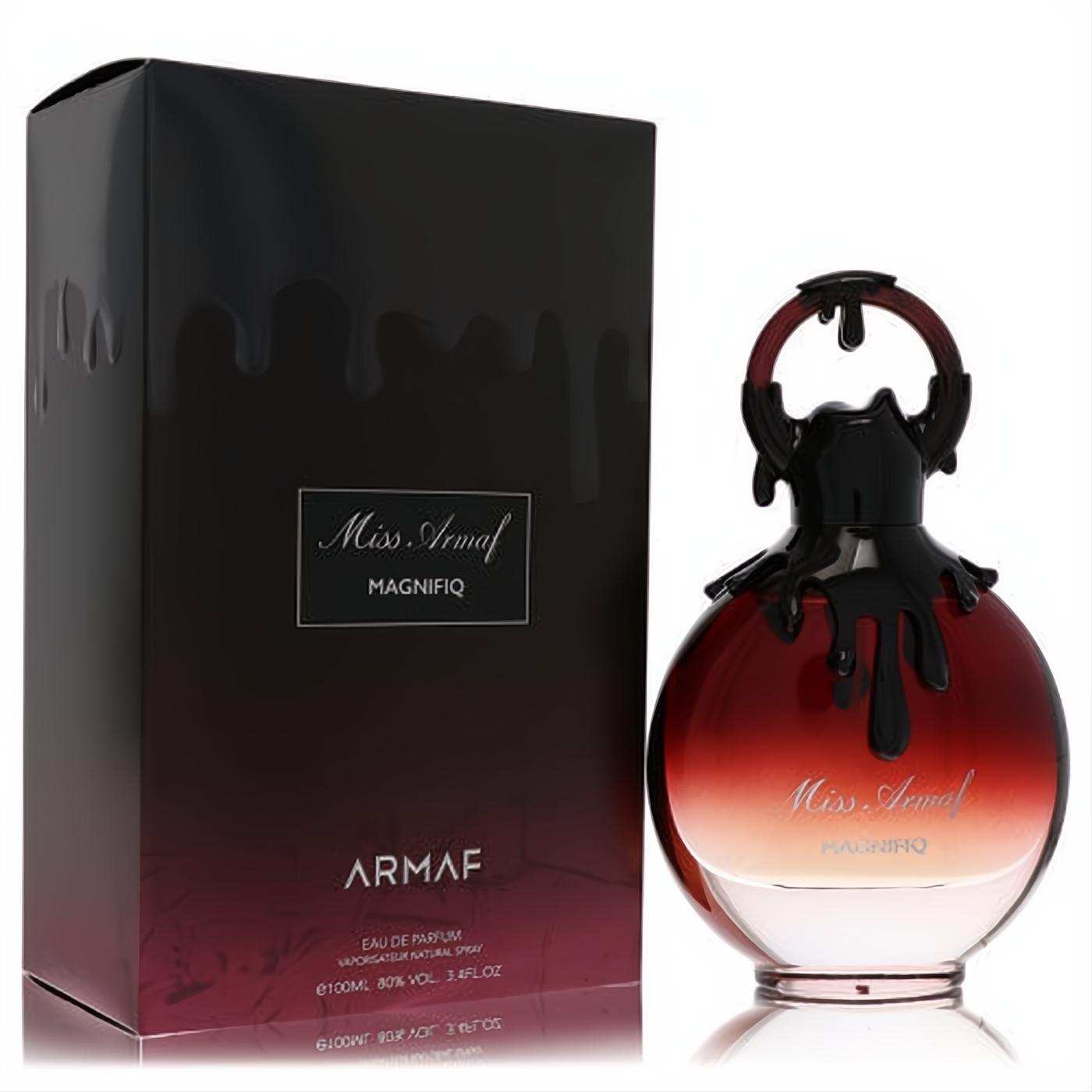 Luxurious Armaf Miss Magnifiq 3.4 oz EDP. Ombre red glass bottle, unique black drip cap, and elegant matching box.