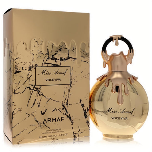 Glamorous Armaf Miss Voce Viva 3.4 oz gold perfume bottle with unique dripping design, black ring cap, and matching golden box.