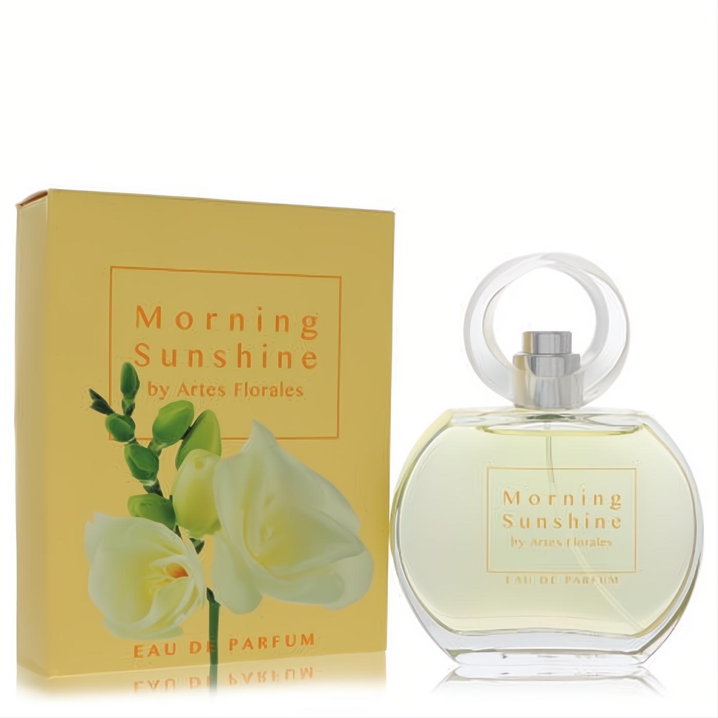 Artes Florales Morning Sunshine Eau De Parfum: elegant clear oval bottle, unique cap, vibrant yellow box with white freesia flowers.