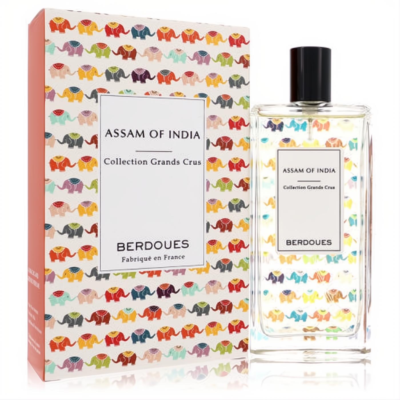 Berdoues Assam of India 3.38 oz EDP spray, a sleek clear bottle with black cap, next to its vibrant elephant-patterned box.