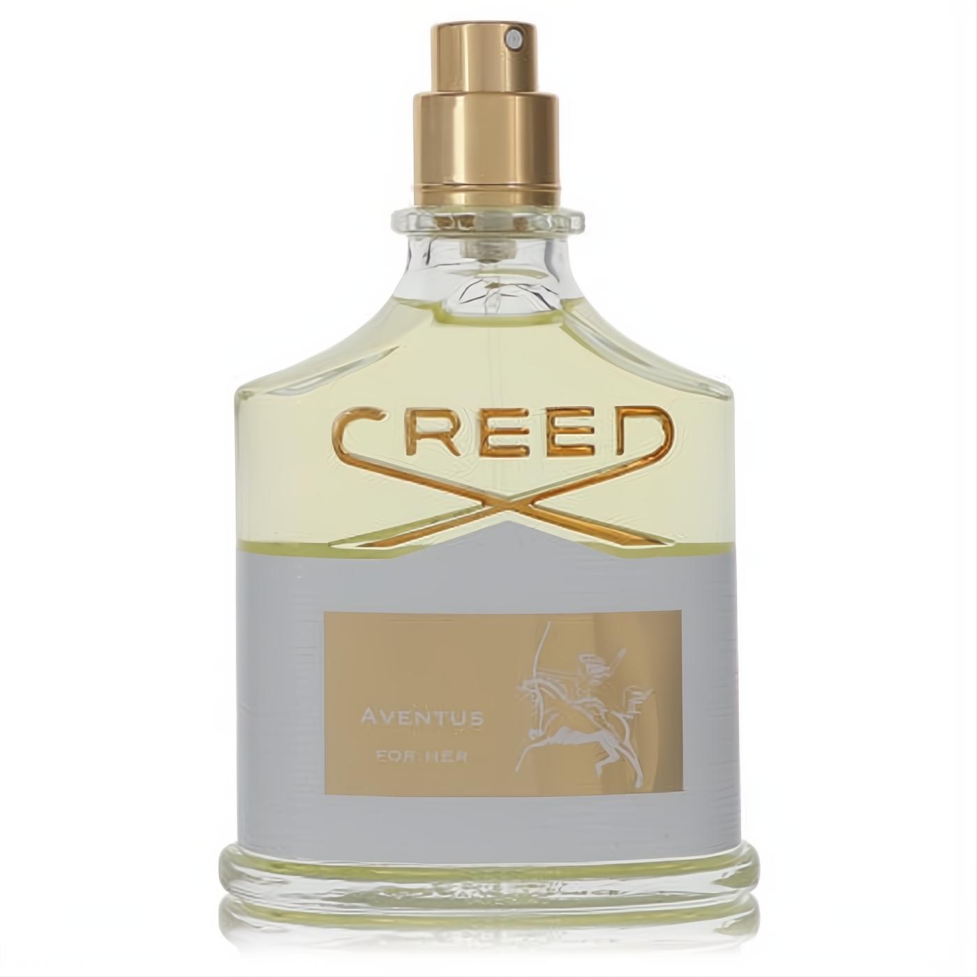 Luxurious Aventus by Creed Eau De Parfum for Her, 2.5 oz tester. Clear glass bottle with gold sprayer, silver label, and equestrian logo.