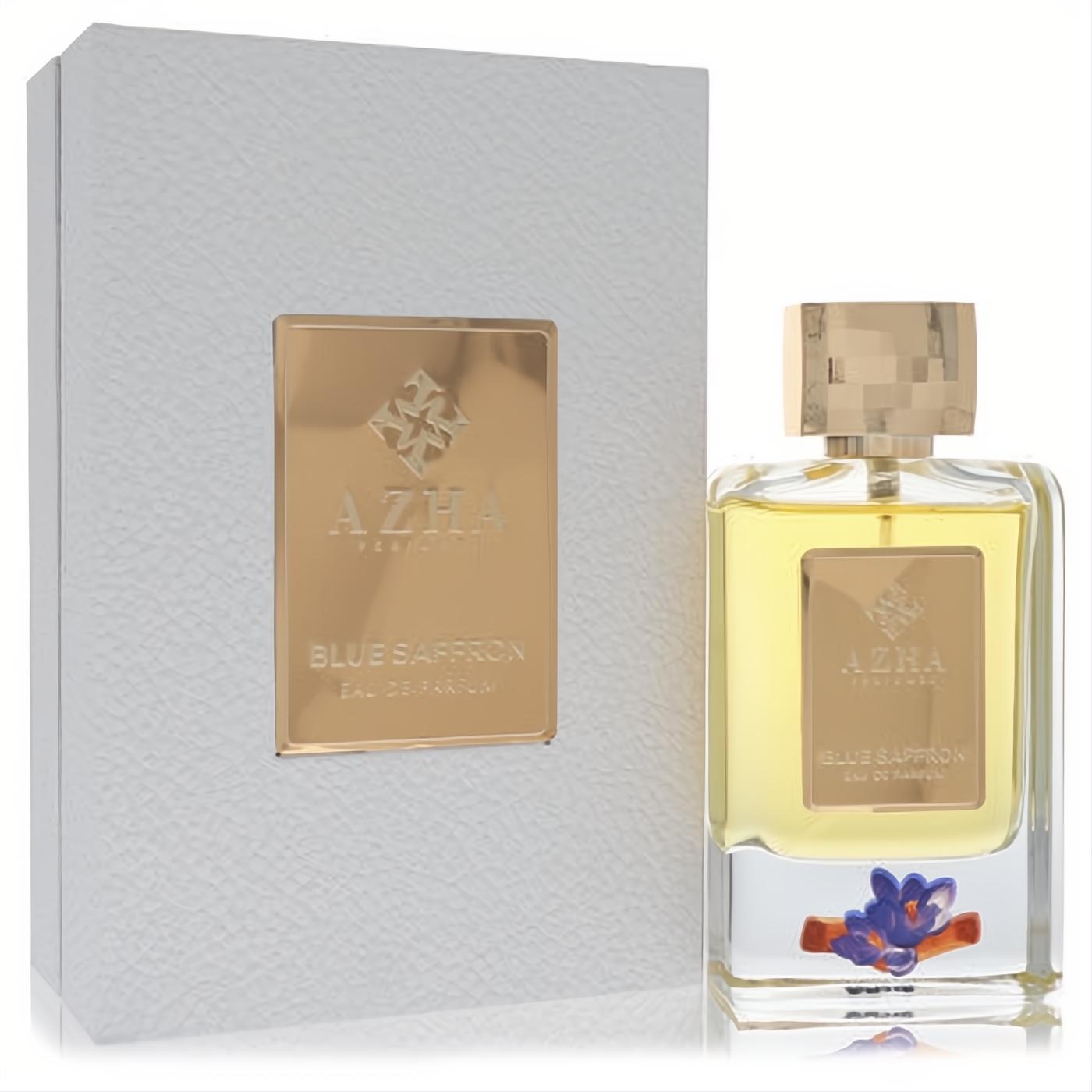 Azha Blue Saffron 3.4 oz EDP. Elegant clear bottle, gold cap, yellow liquid, vibrant saffron flower design. Luxurious white box.