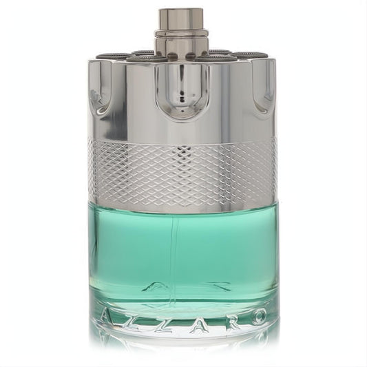 Azzaro Wanted Tonic men's cologne bottle featuring vibrant aqua liquid and a striking silver metallic revolver-style cap.