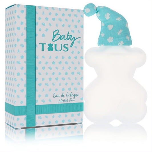 Delightful Baby Tous alcohol-free cologne, 3.4 oz. Frosted bear bottle with charming blue sleeping hat, next to its elegant white and blue box.