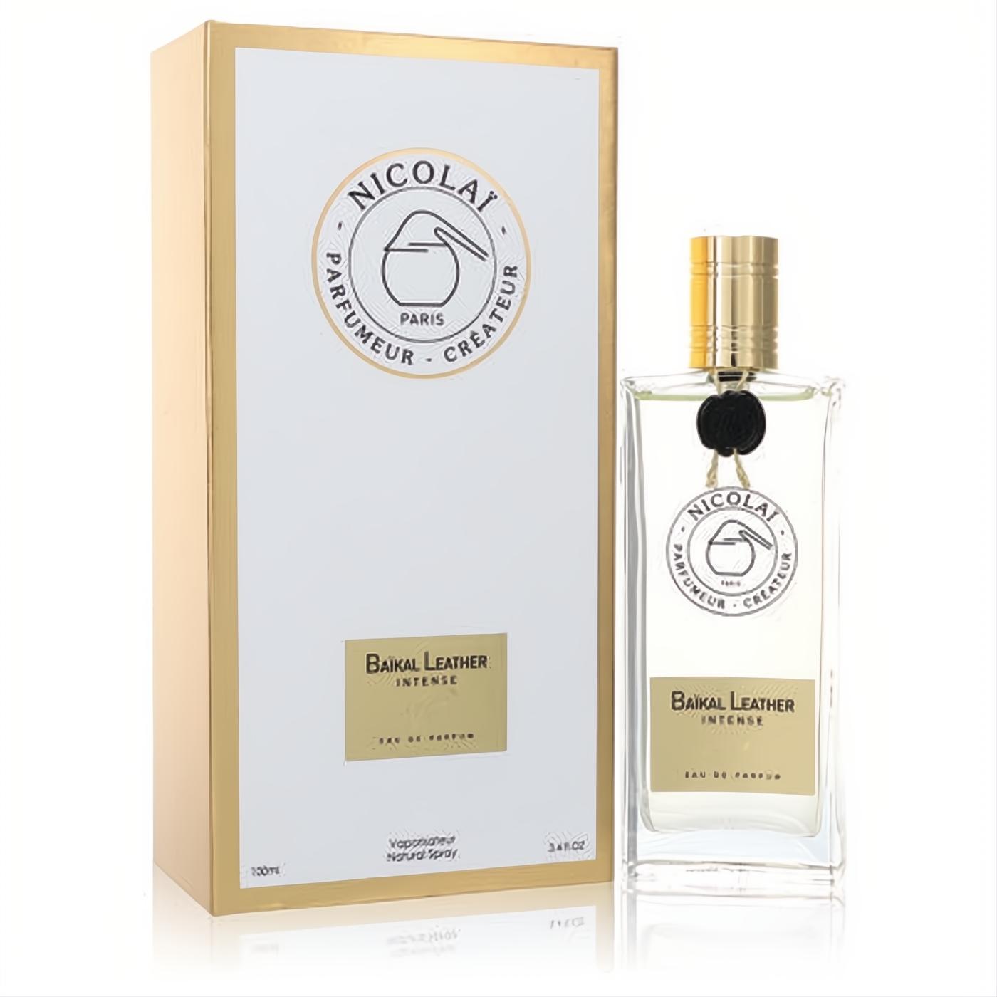 Sophisticated Nicolai Baikal Leather Intense 3.4 oz unisex EDP, featuring a clear bottle with gold accents and a chic white & gold box.