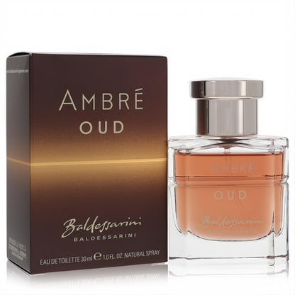 Baldessarini Ambre Oud 1.0 oz EDT. Luxurious amber cologne in a clear glass bottle with silver cap, displayed with its stylish brown box.