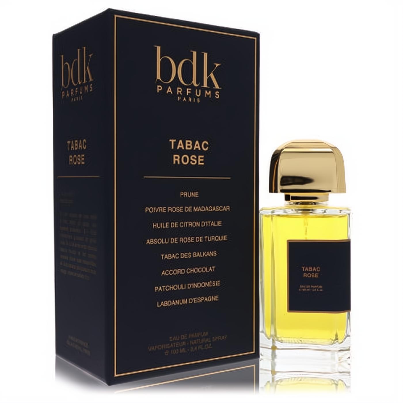 Bdk Tabac Rose 3.4 oz unisex EDP. Luxurious clear bottle, golden cap, amber liquid, and elegant black box.