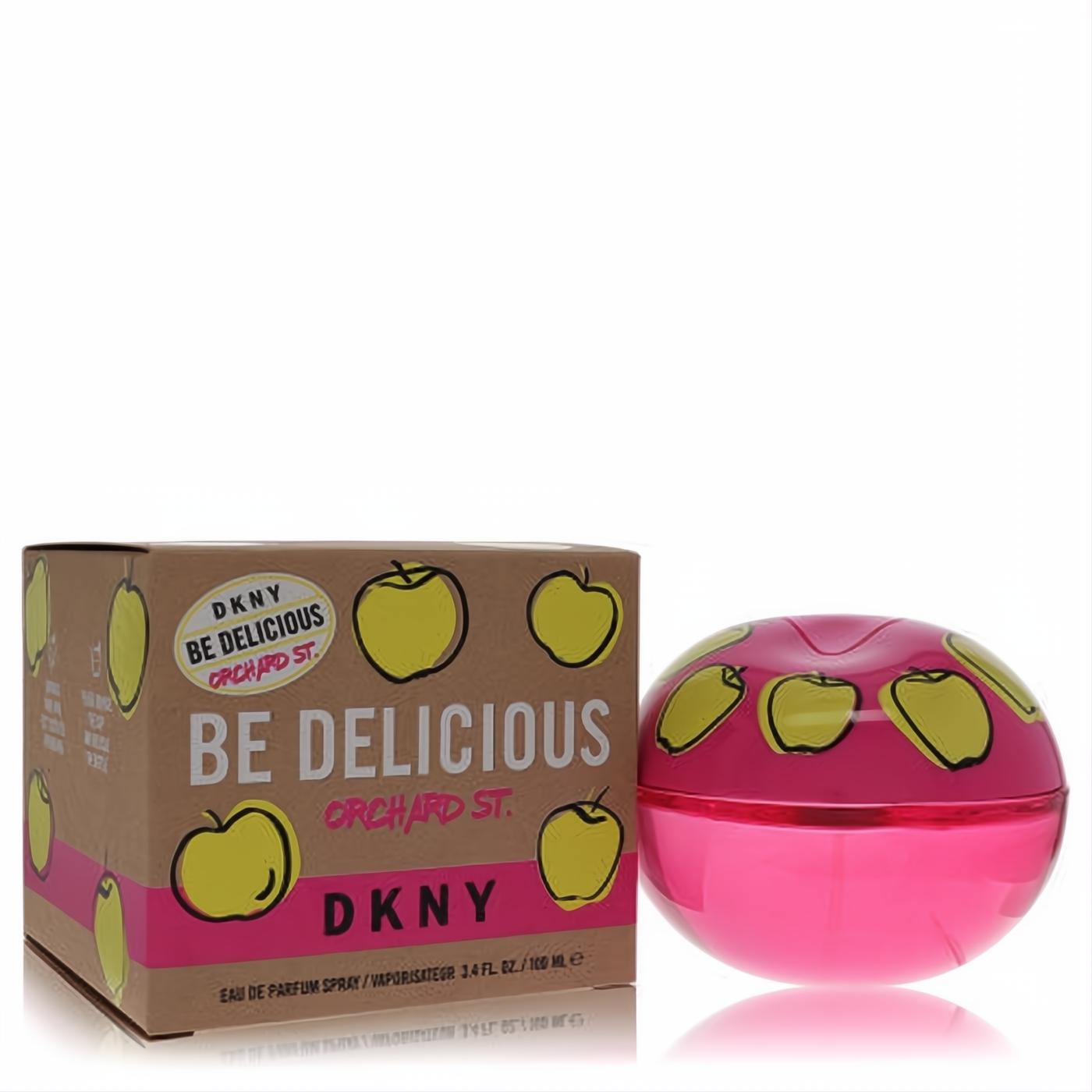 DKNY Be Delicious Orchard Street 3.4 oz perfume: vibrant pink apple bottle and brown box with yellow apple graphics.