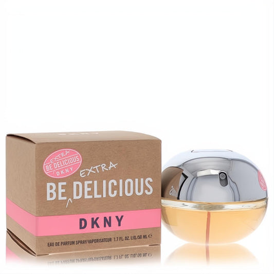 DKNY Be Extra Delicious 1.7 oz women's Eau De Parfum. Amber spherical glass bottle with metallic silver cap, next to its stylish brown and pink box.