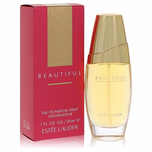 Estee Lauder Beautiful 1 oz / 30ml Eau de Parfum. Elegant clear bottle with golden liquid, sleek gold cap, and vibrant fuchsia box.