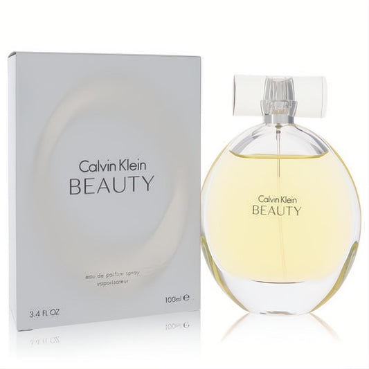 Calvin Klein Beauty Eau De Parfum 3.4 oz spray. Elegant clear glass bottle with golden liquid and sleek branded white box.
