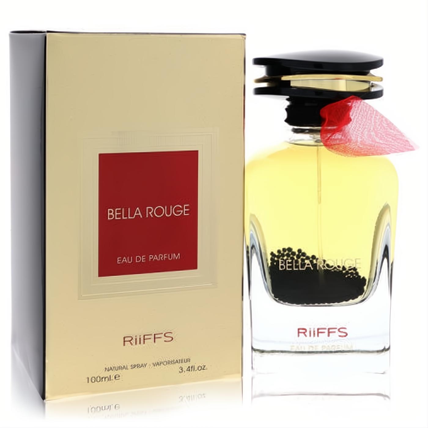 Elegant Bella Rouge Riiffs 3.4oz unisex Eau De Parfum. Golden box, clear bottle with golden liquid, black particles, and a chic red bow.