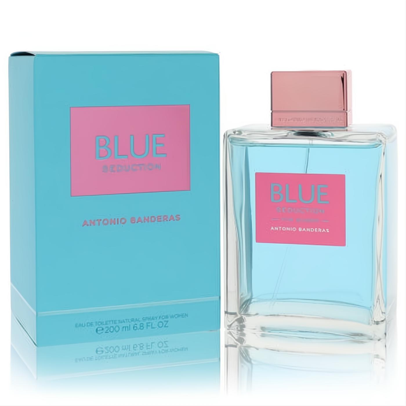 Blue Seduction Antonio Banderas 6.8 oz EDT spray for women. Elegant clear bottle, rose gold cap, and vibrant blue/pink box.