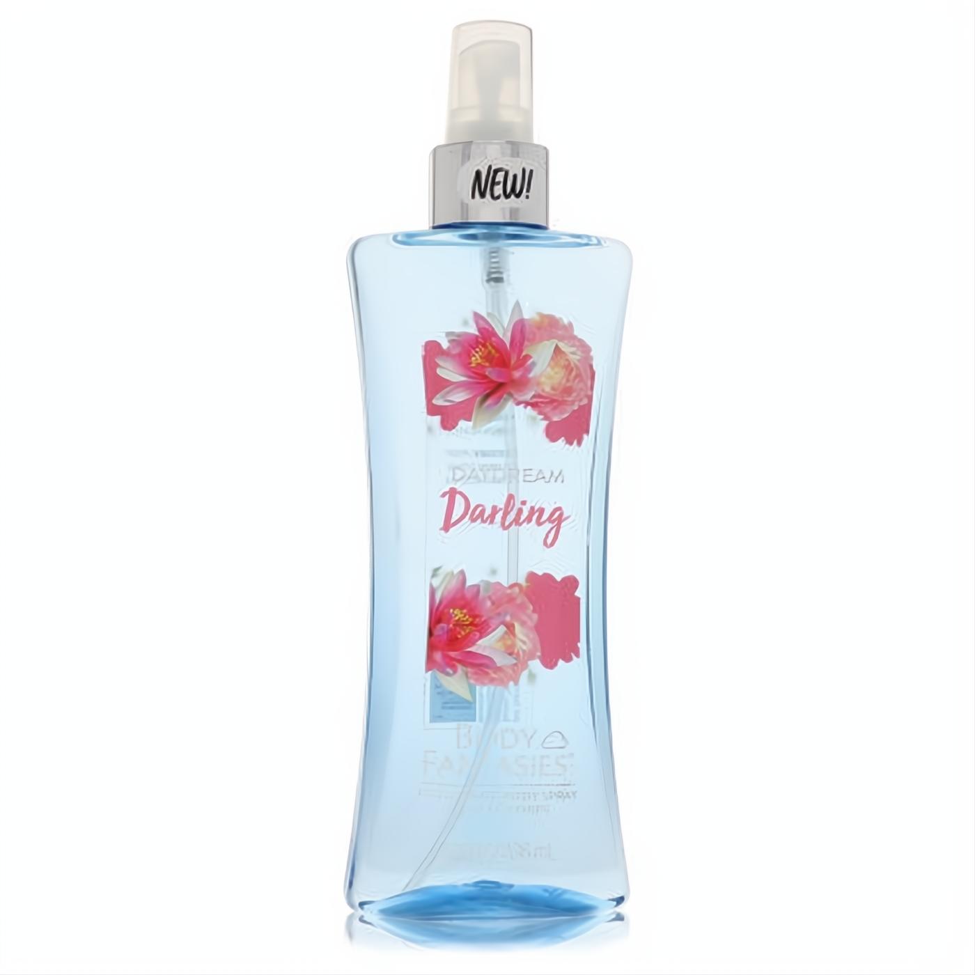 Elegant 8 oz Body Fantasies Daydream Darling body spray. Clear blue bottle features romantic pink floral art and "NEW!" on the silver sprayer.