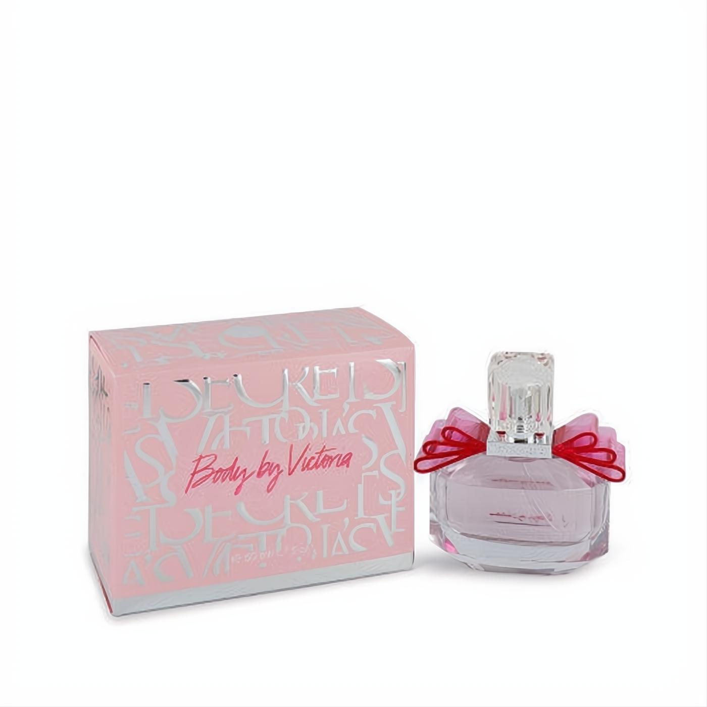 Body by Victoria's Secret 1.7 oz EDP. Chic pink box, elegant clear glass bottle with light pink fragrance and a charming red ribbon bow.