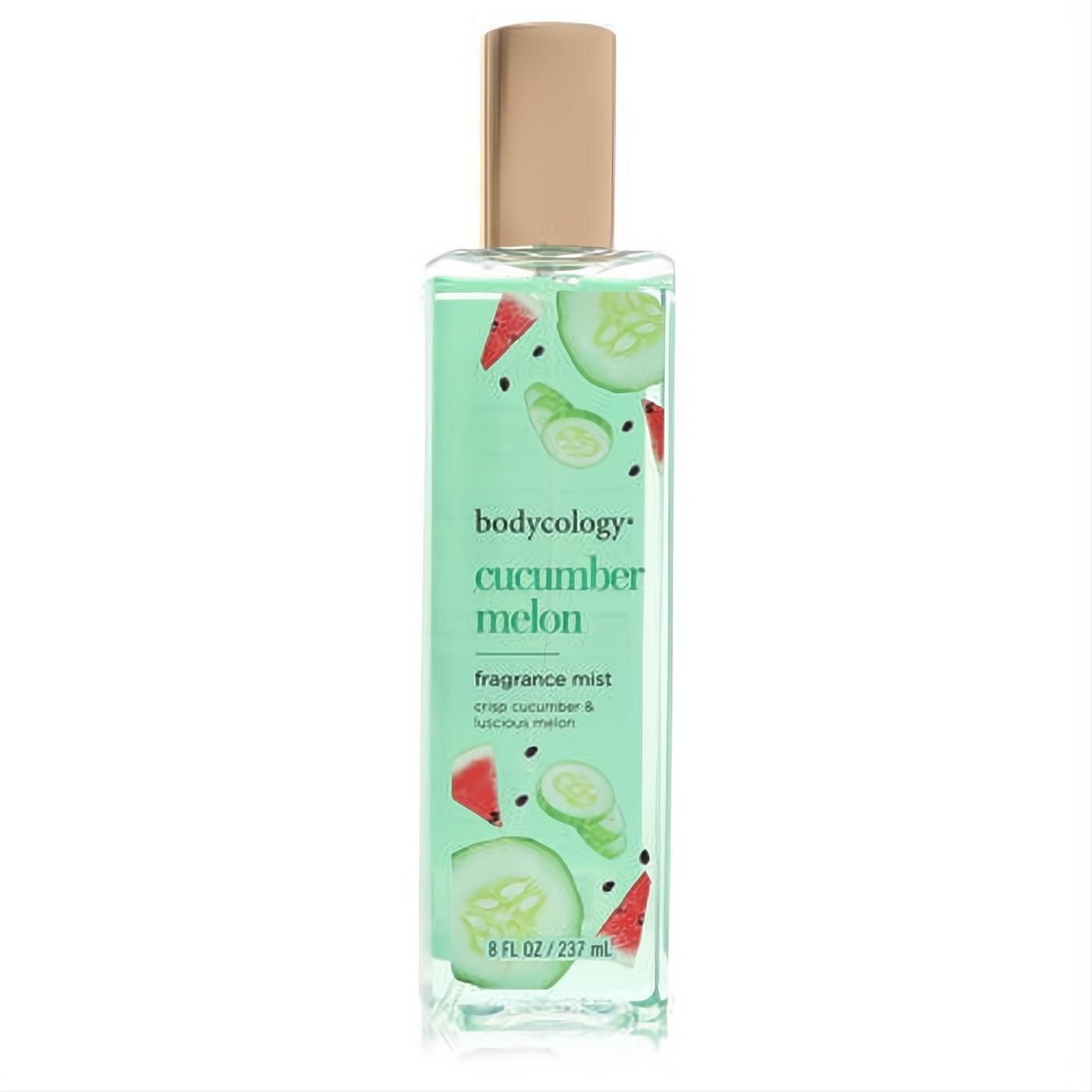 Invigorating Bodycology Cucumber Melon 8 oz fragrance mist. Clear glass bottle, rose gold cap, and lively label with cucumber and watermelon.