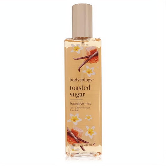 Sweet Bodycology Toasted Sugar 8 oz fragrance mist. Clear bottle, warm amber liquid, with vanilla bean and plumeria design.