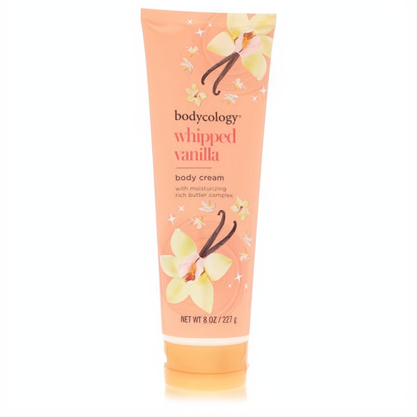 Bodycology Whipped Vanilla 8 oz body cream. This peachy orange tube features elegant vanilla flowers and beans, promising a sweet, rich scent.
