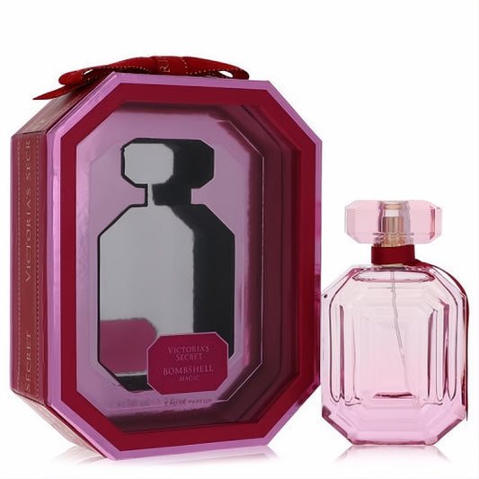 Luxurious Victoria's Secret Bombshell Magic 1.7 oz pink faceted perfume bottle and octagonal gift box with red bow.