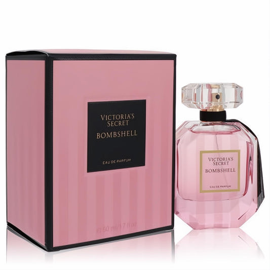 Victoria's Secret Bombshell 1.7 oz Eau De Parfum: a captivating pink faceted glass bottle with a chic striped box.