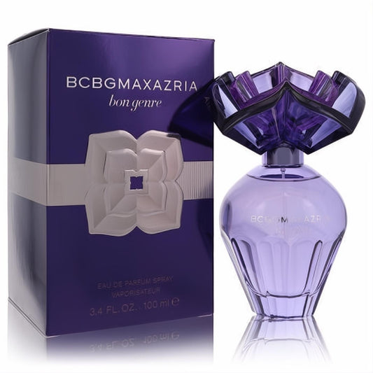 BCBGMAXAZRIA Bon Genre 3.4 oz Eau de Parfum. Lavender bottle with a unique purple floral cap, beside its elegant deep purple box.