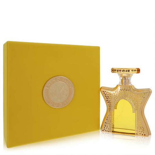 Luxurious Bond No. 9 Dubai Citrine 3.4 oz unisex EDP. Gold star bottle with intricate filigree, vibrant yellow box & gold emblem.