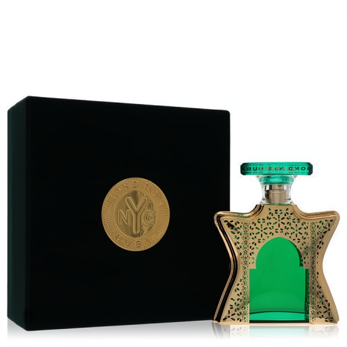 Stunning Bond No. 9 Dubai Emerald 3.3 oz unisex EDP. Gold filigree bottle with vibrant emerald green, displayed with a black box and gold emblem.