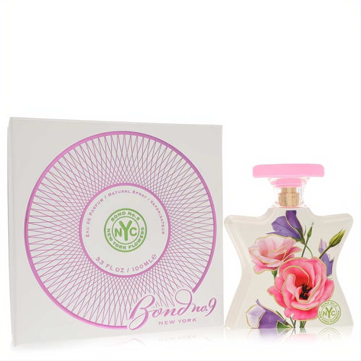 Stunning Bond No. 9 New York Flowers 3.3 oz EDP spray. Star-shaped bottle with vibrant pink florals, gold neck, pink cap, and elegant white box.