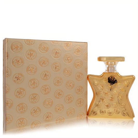 Elegant Bond No. 9 Signature 3.3 oz EDP spray in a gleaming gold star bottle with embossed NYC emblems, alongside its matching gift box.